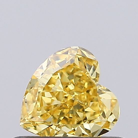Actual 0.34 carat Fancy Vivid Yellow Heart lab-grown diamond
