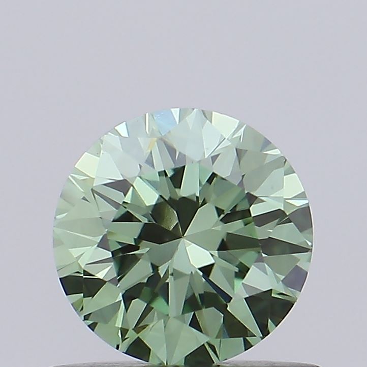 Actual 0.63 carat Vivid Green Round lab-grown diamond
