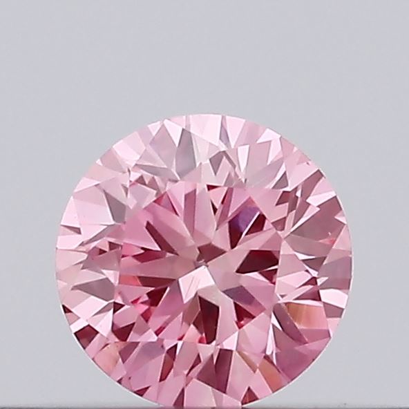 Actual 0.17 carat Vivid Pink Round lab-grown diamond