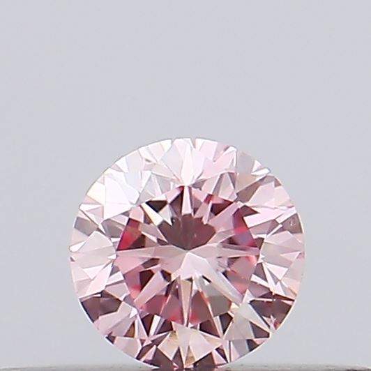 Actual 0.19 carat Intense Pink Round lab-grown diamond