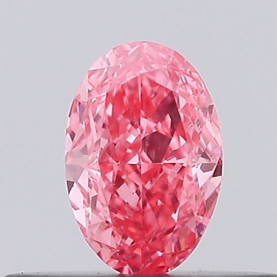 Actual 0.27 carat Vivid Pink Oval lab-grown diamond