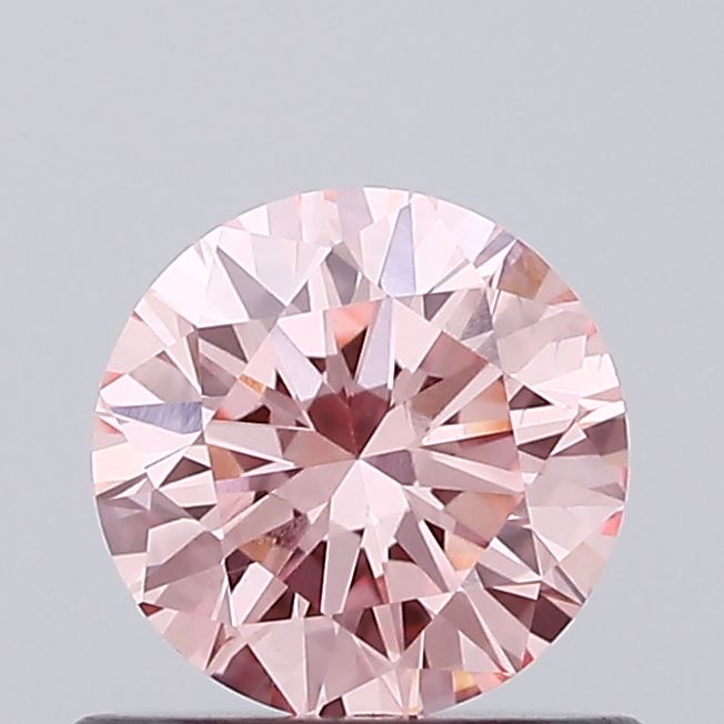 Actual 0.66 carat Vivid Pink Round lab-grown diamond