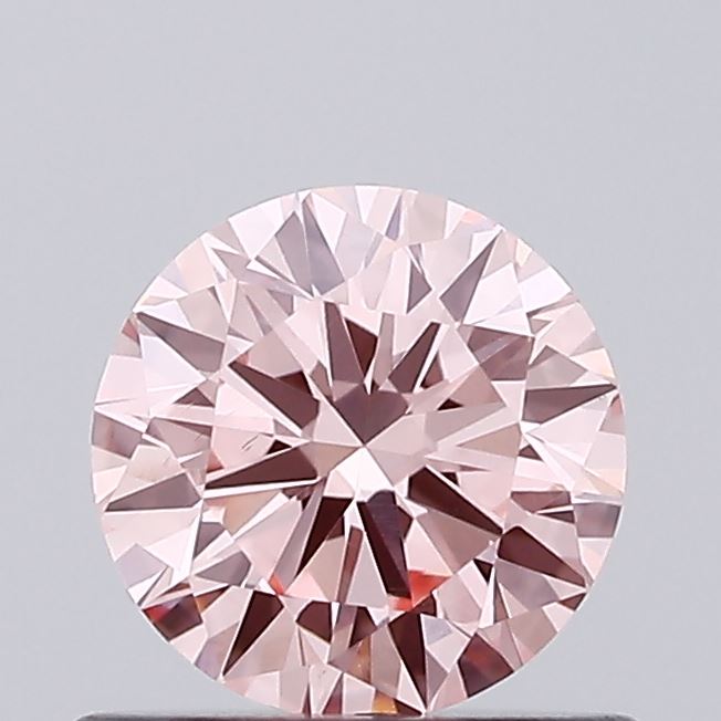 Actual 0.66 carat Vivid Pink Round lab-grown diamond