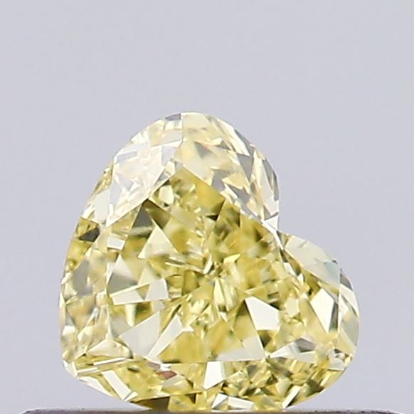 Actual 0.34 carat Fancy Intense Yellow Heart lab-grown diamond